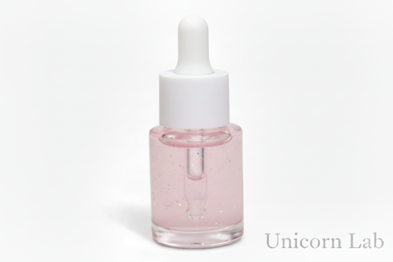 Glass 15ml dropper bottle on a white background