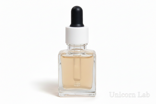 Clear glass 15ml square dropper bottle with black and white cap on a white background