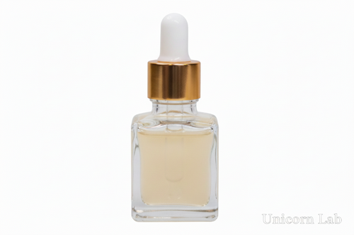 Clear 15ml square glass dropper bottle with gold cap on a white background