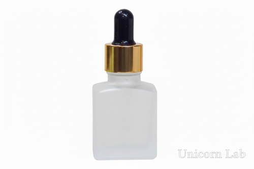 Frosted 15ml Square glass dropper bottle with gold cap on a white background
