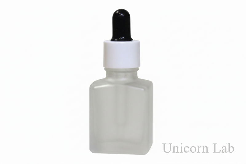 15ml Frosted square dropper bottle with black and white cap on back background for nail serum