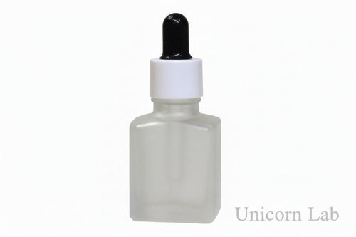 15ml Frosted square dropper bottle with black and white cap on back background for nail serum