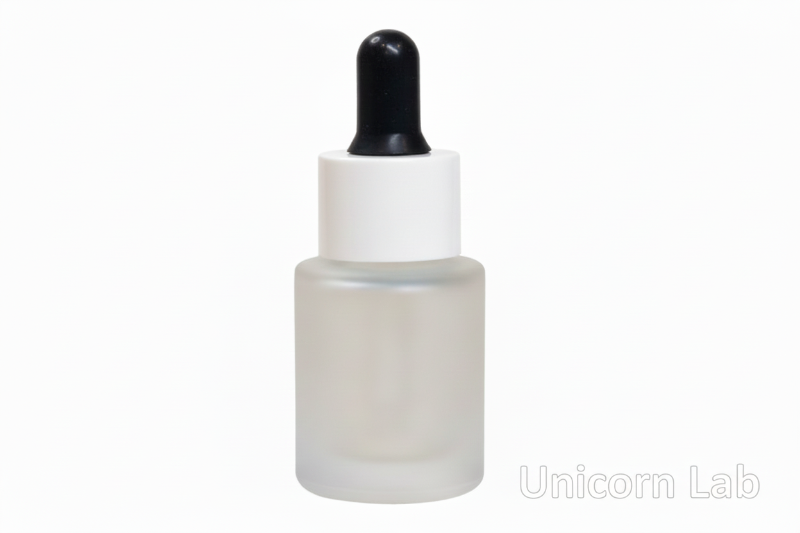 Frosted glass  15ml flat shoulder dropper bottle with black cap on a white background