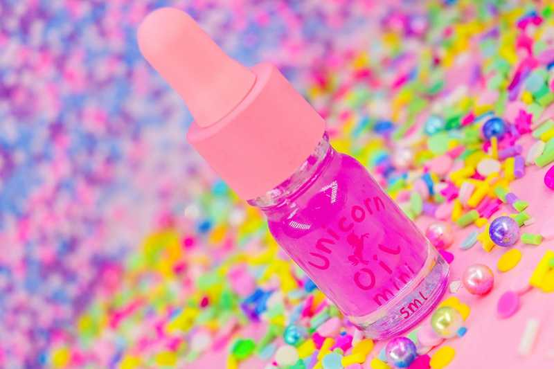 Tutti Frutti scented cuticle oil mini dropper with vibrant confetti scatter, lightweight nail serum