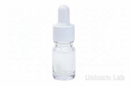 Clear glass  5ml dropper bottle with white cap on a white background