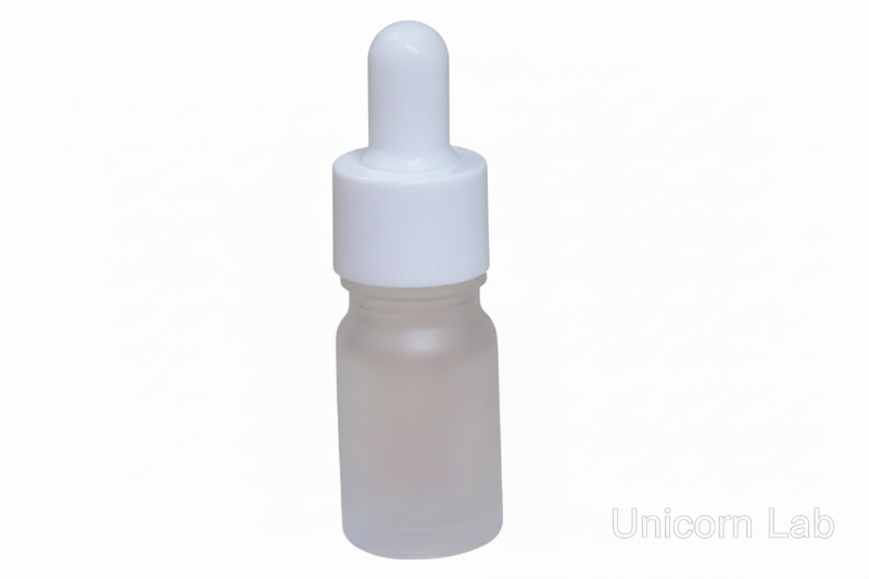 Frosted 5ml round dropper bottle with white cap on a white background