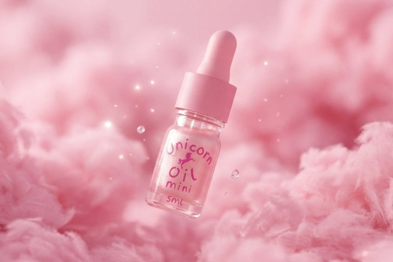 Fairy Floss scented Cuticle Oil 5ml mini bottle on a fluffy pink background
