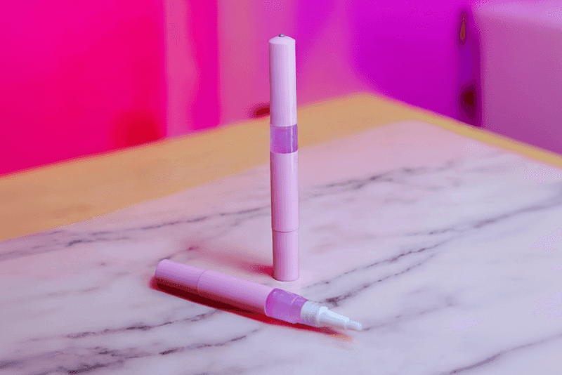 Tutti Frutti cuticle oil pen with clean background, non-greasy nail serum for daily hydration
