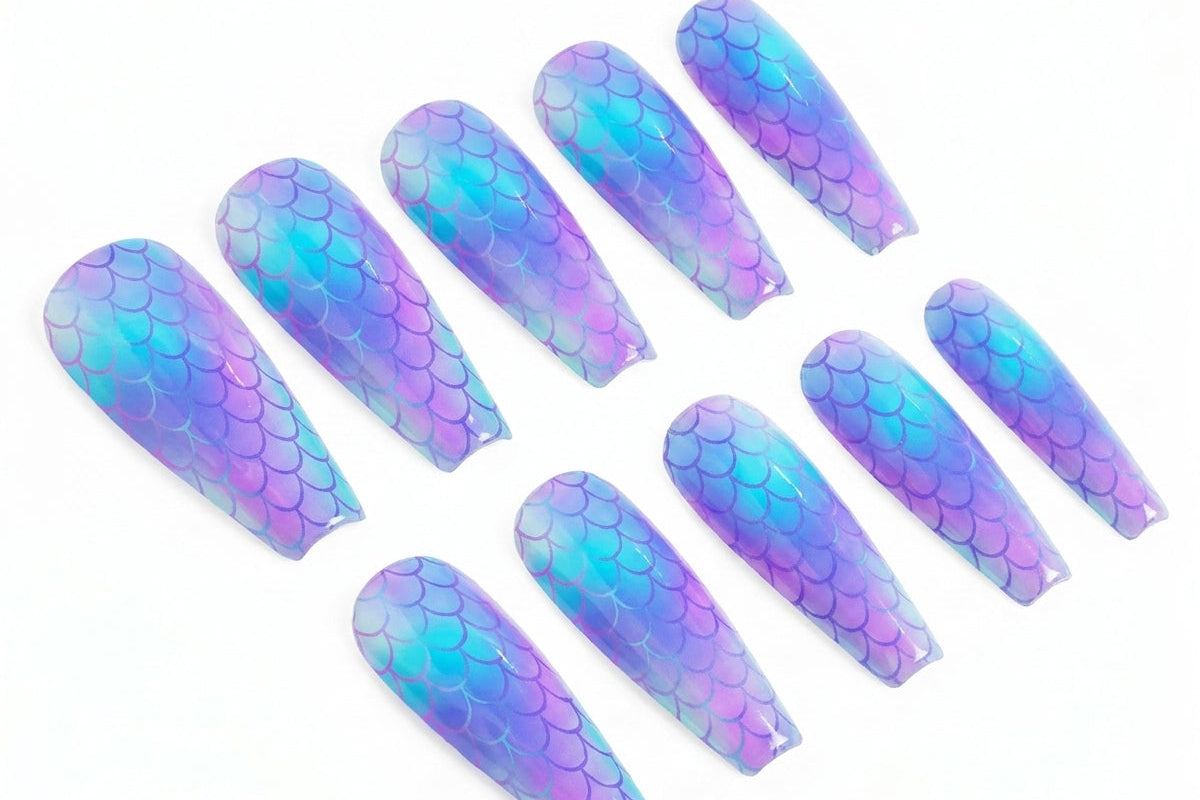 Set of blue and purple gradient nail art stickers on a white background