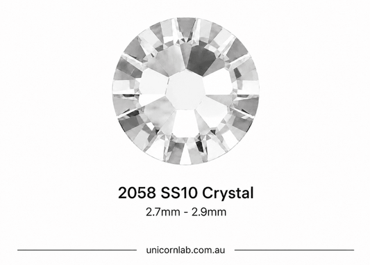 Crystal stone labeled '2058 SS10 Crystal' with size range '2.7mm - 2.9mm' on a white background. Swarovski SS10 Crystal | Flatback Nail Crystals | Genuine 2025 Rhinestones