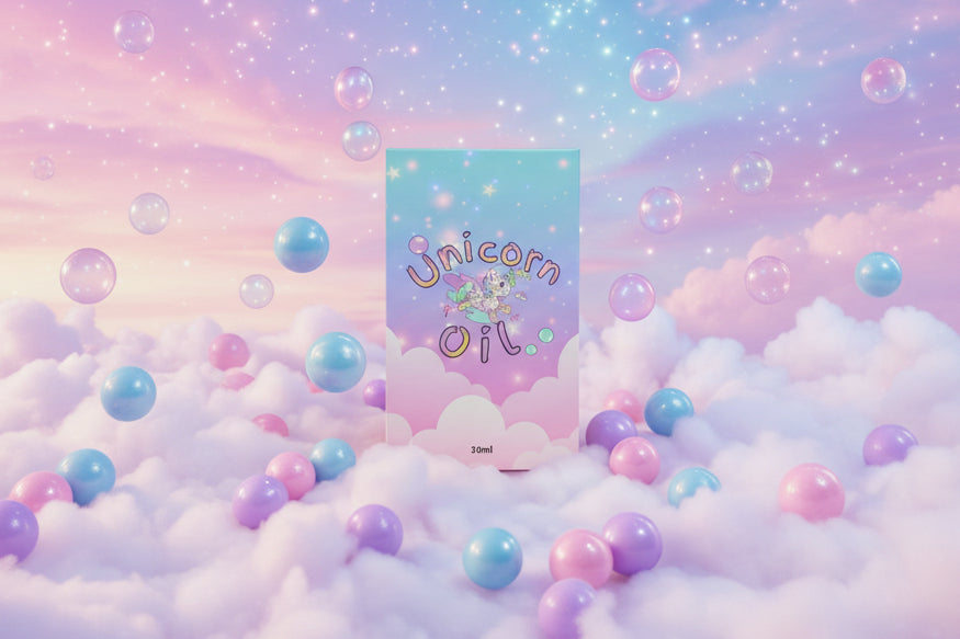 Bubblegum Unicorn 30ml Cuticle Oils luxury magnetic close style packaging surrounded by bubble and bubblegum falling. Product is in front of a pastel cloud sky - Unicorn Lab