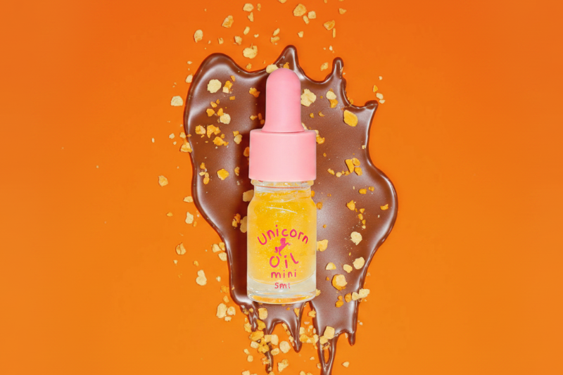 Jaffa Unicorn Cuticle Oil - Unicorn Lab with a chocolate smear and orange crumbs