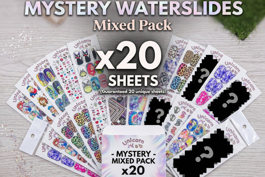 Mystery waterslide pack with 20 sheets on a light surface