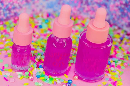 Tutti Frutti scented cuticle oil range in dropper bottles, nourishing nail serum for hydration