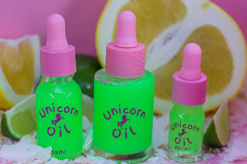 Green cuticle oil with tropical citrus styling, non-greasy nail serum